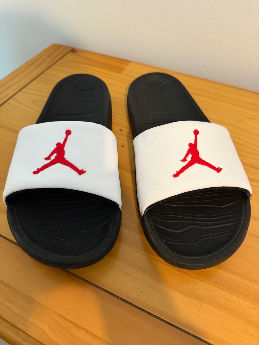 Jordan Men’s Black & White Slide Sandals with Red Jumpman